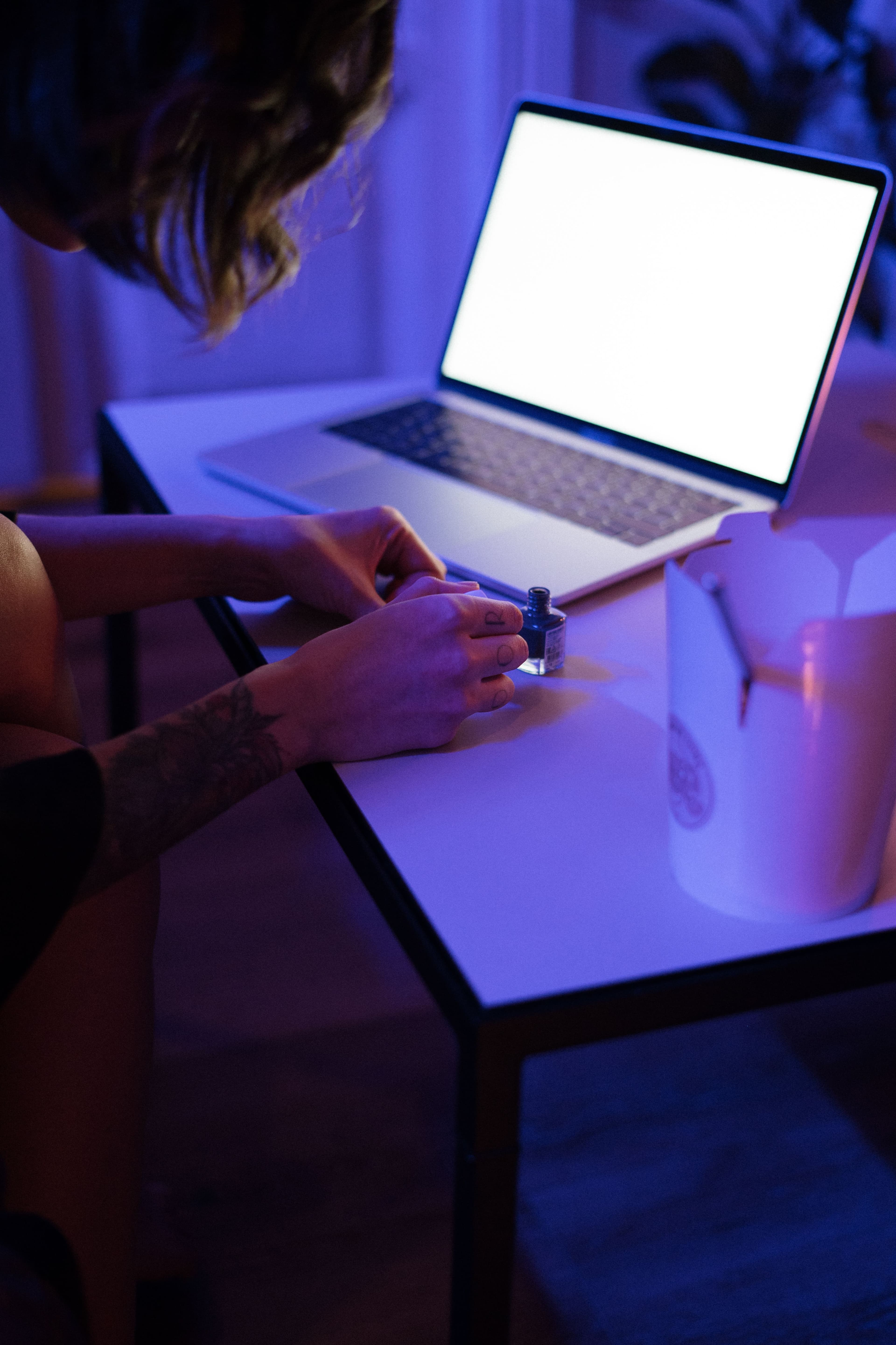 Photographer reviewing images in a studio workspace