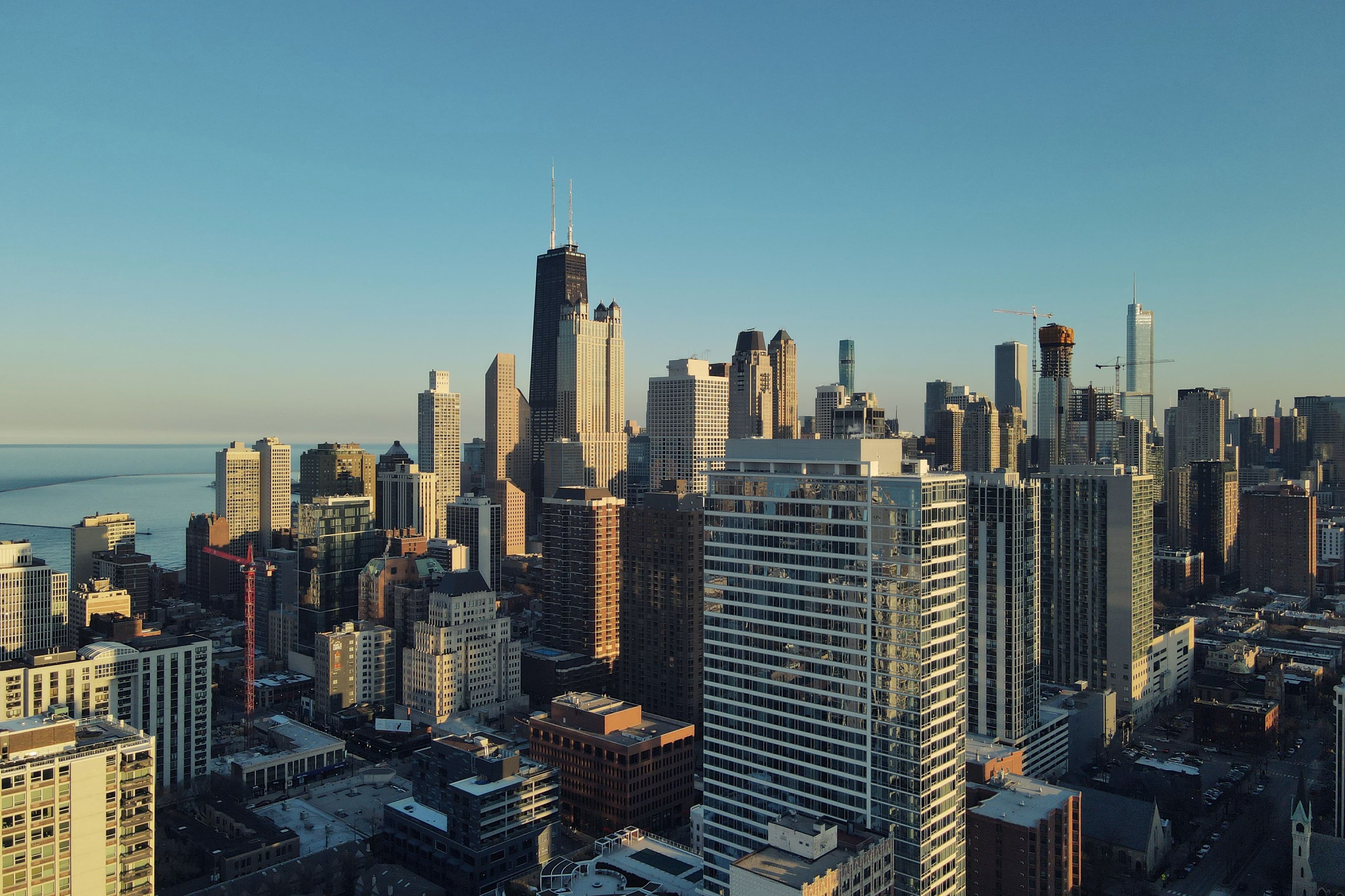 Sunlit aerial view of downtown skyscrapers
